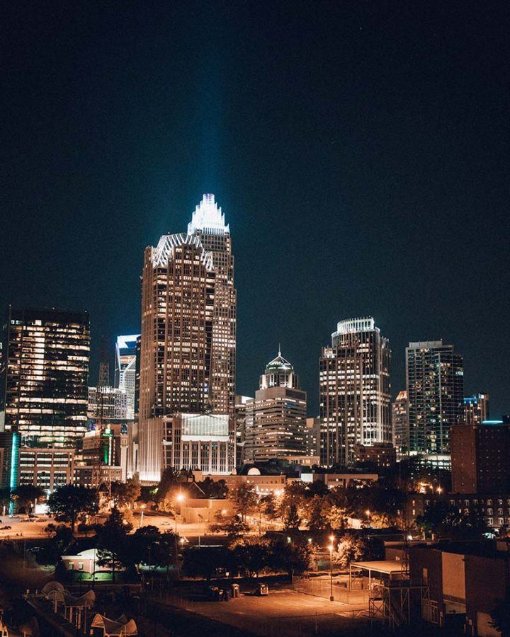 buildings lit up at night in Charlotte, North Carolina